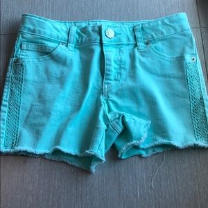 A girls teal jean short